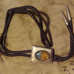 Trending vintage cowboy / western wear. Picture jasper, brass top grain leather